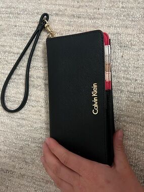 Calvin Klein Black Wristlet with Pink Trim and Gold Logo